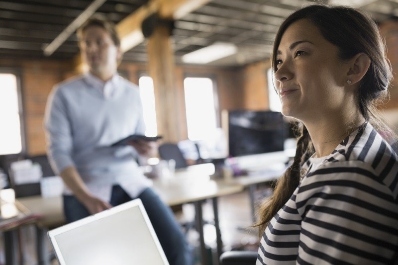 Businesswoman with laptop in meeting Businesswoman with laptop in meeting