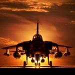 Tornado war plane silhouette at sunset