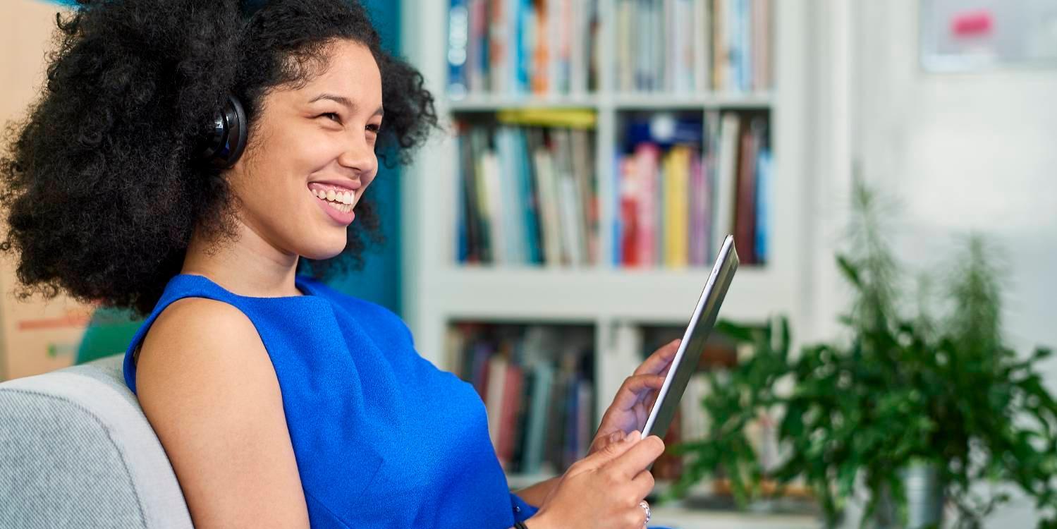 Media Customer Experience Woman working on tablet
