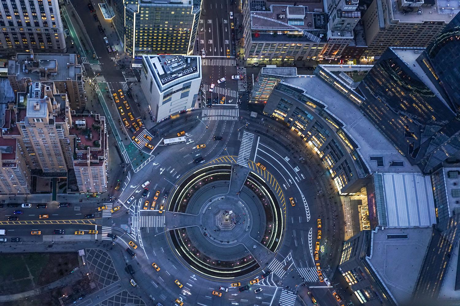 Aerial view of a city roundabout at night