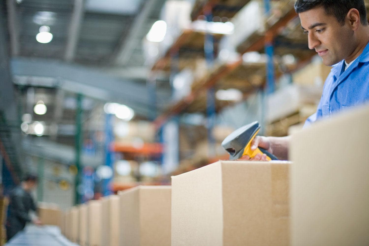 Warehouse Worker Scanning Barcode