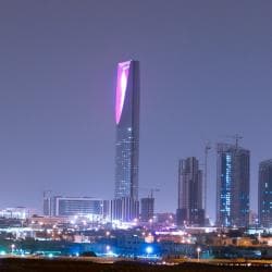 Outside distance skyline view on Riyadh Kingdom tower and other skyscrapers at night