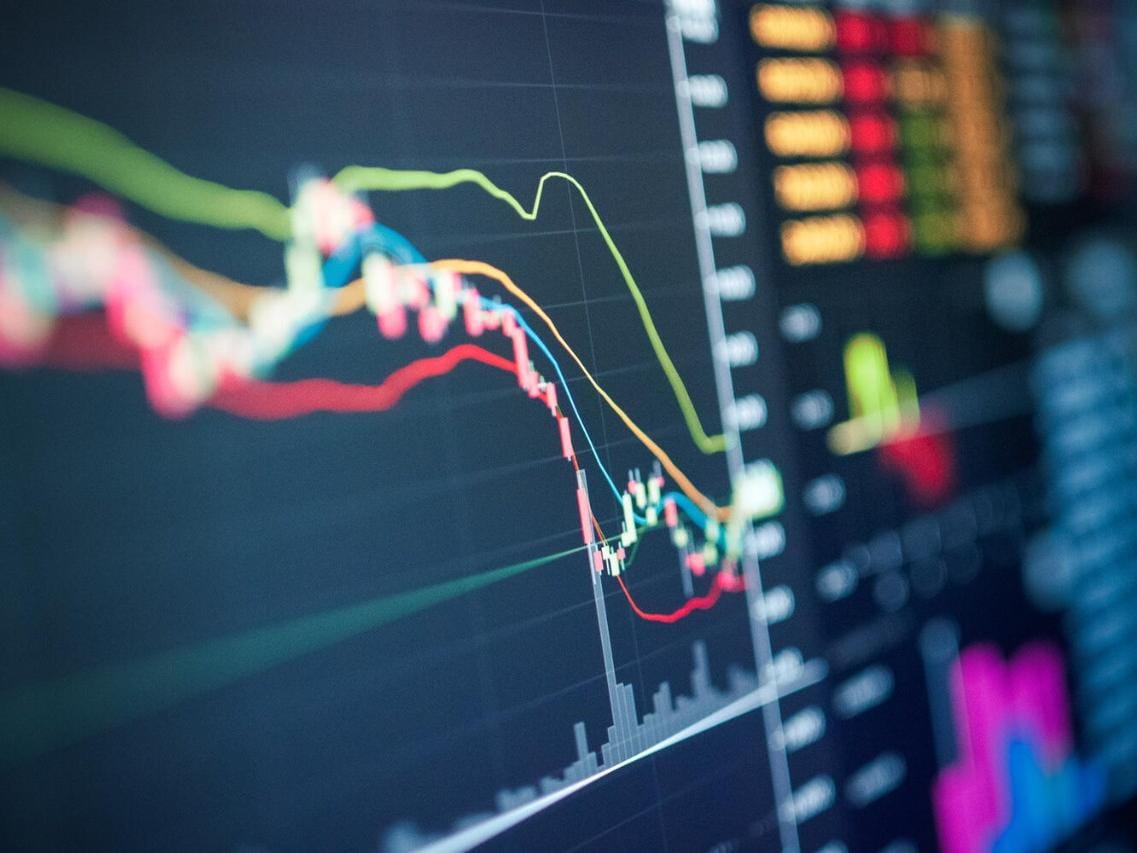 Business analytics stock graph on large screen
