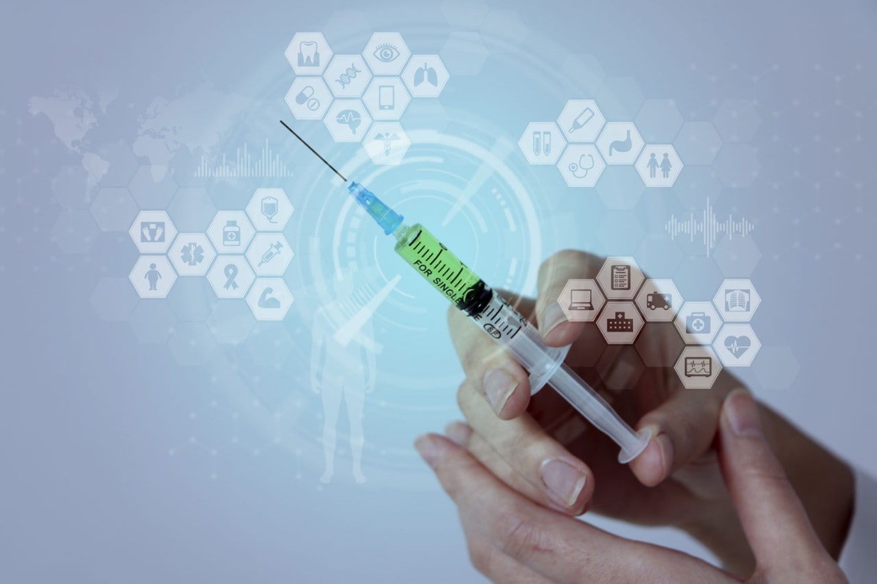 hand holding syringe with illustration overlay
