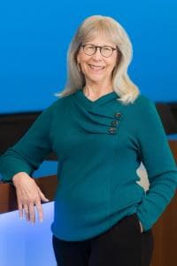 Vertical Portrait of Patricia Brown standing