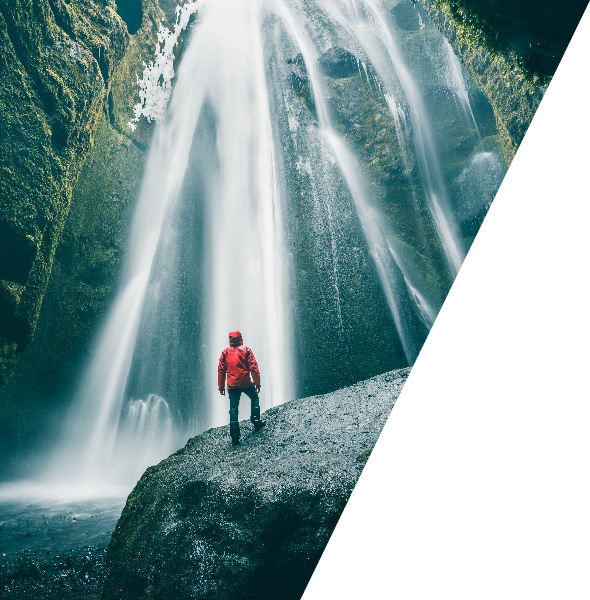Triangle shape with man at waterfall background