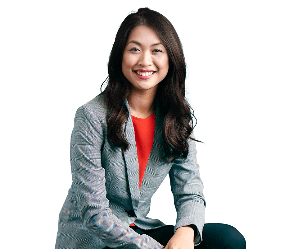 Woman in gray suit and red top sitting Woman in gray suit and red top sitting