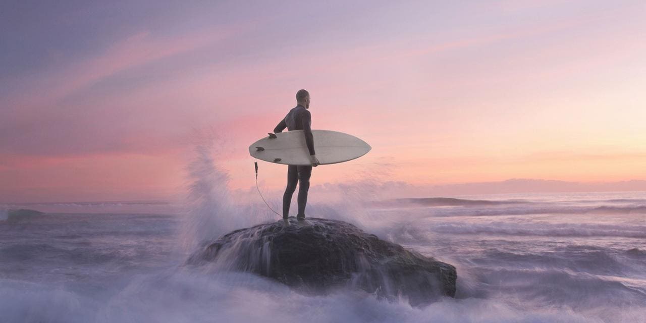 Surfer looking at waves