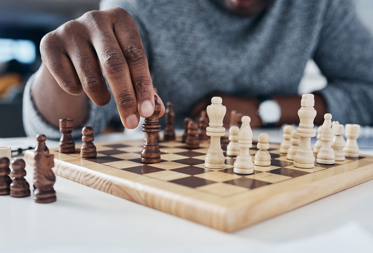 Close up of man playing chess