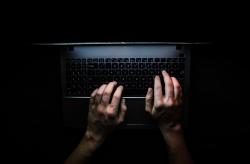 Hacker hacking the server in the dark web