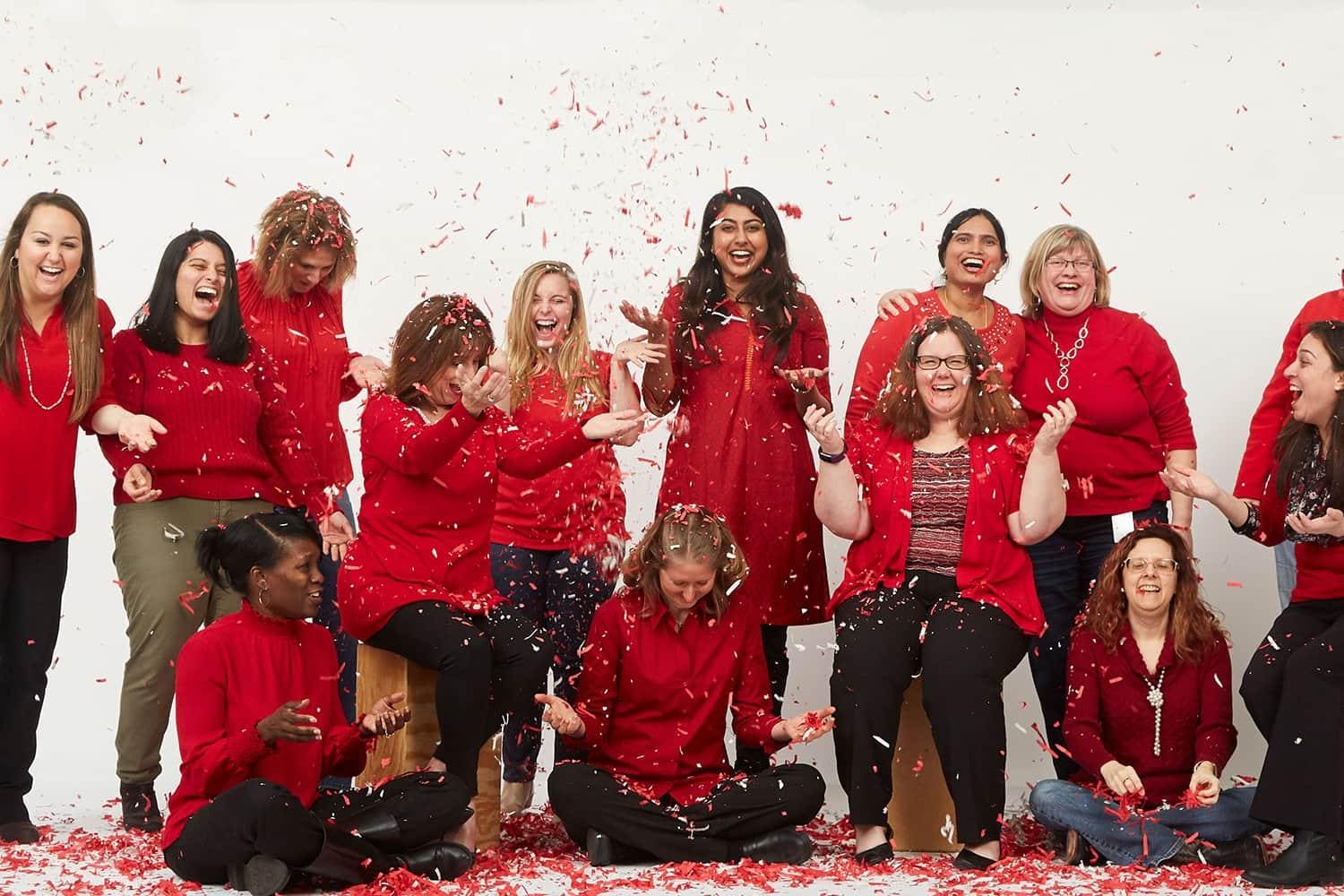 SAS women employees wearing red