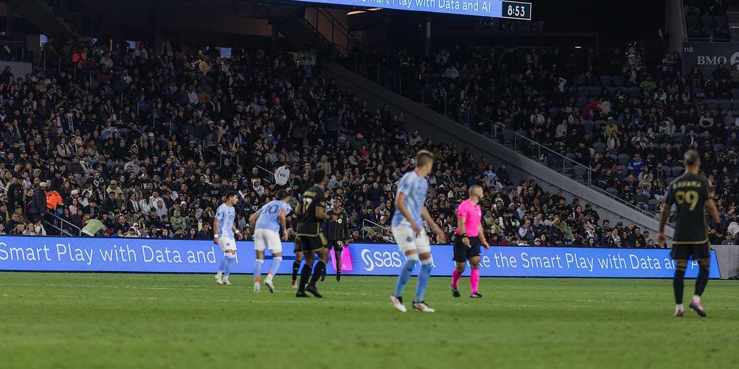 Football players on the field for LAFC game
