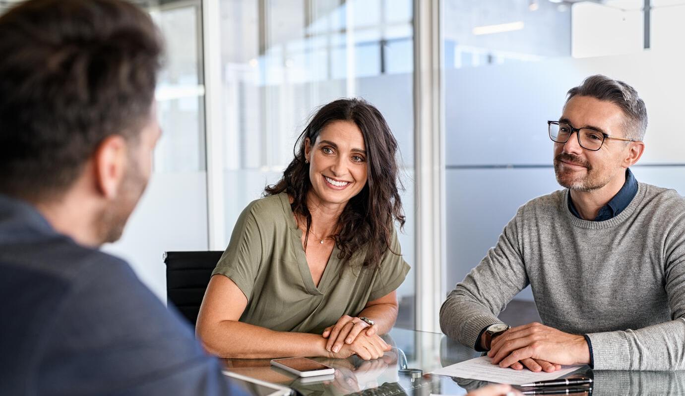 Couple meeting financial advisor for investment
