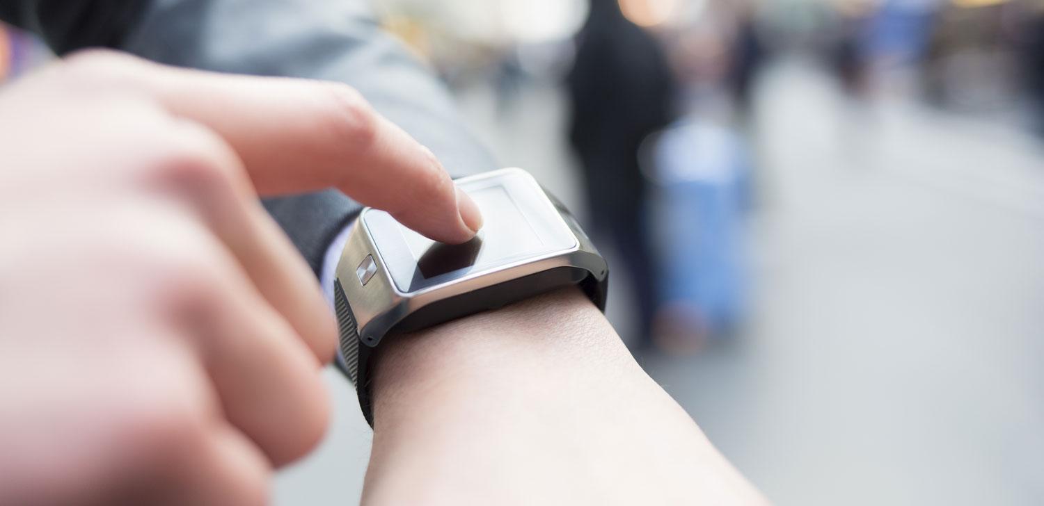 Person touching watch Person touching watch