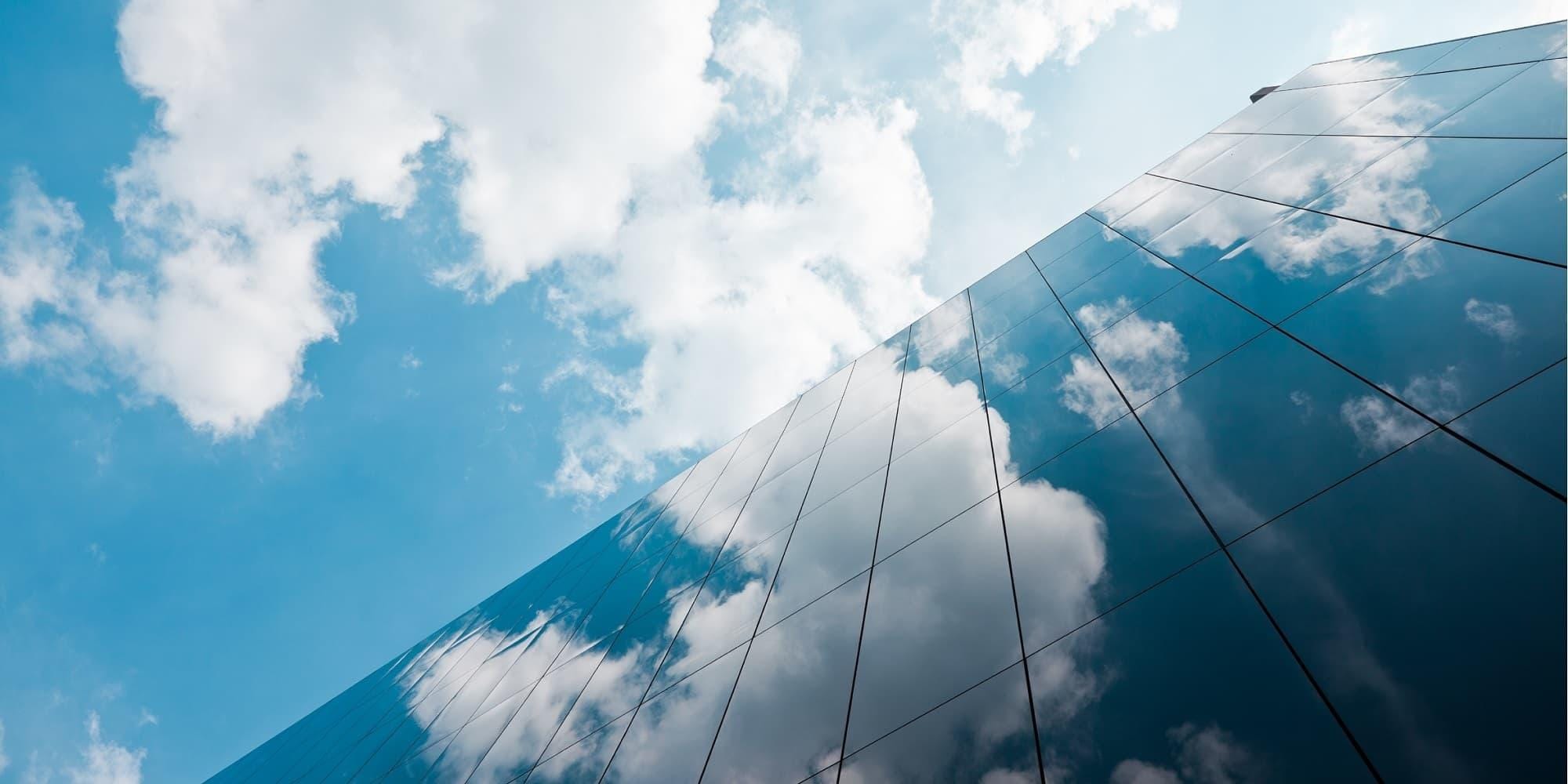 SAS Event Stream Processing and Confluent Cloud Clouds reflected on commercial building windows