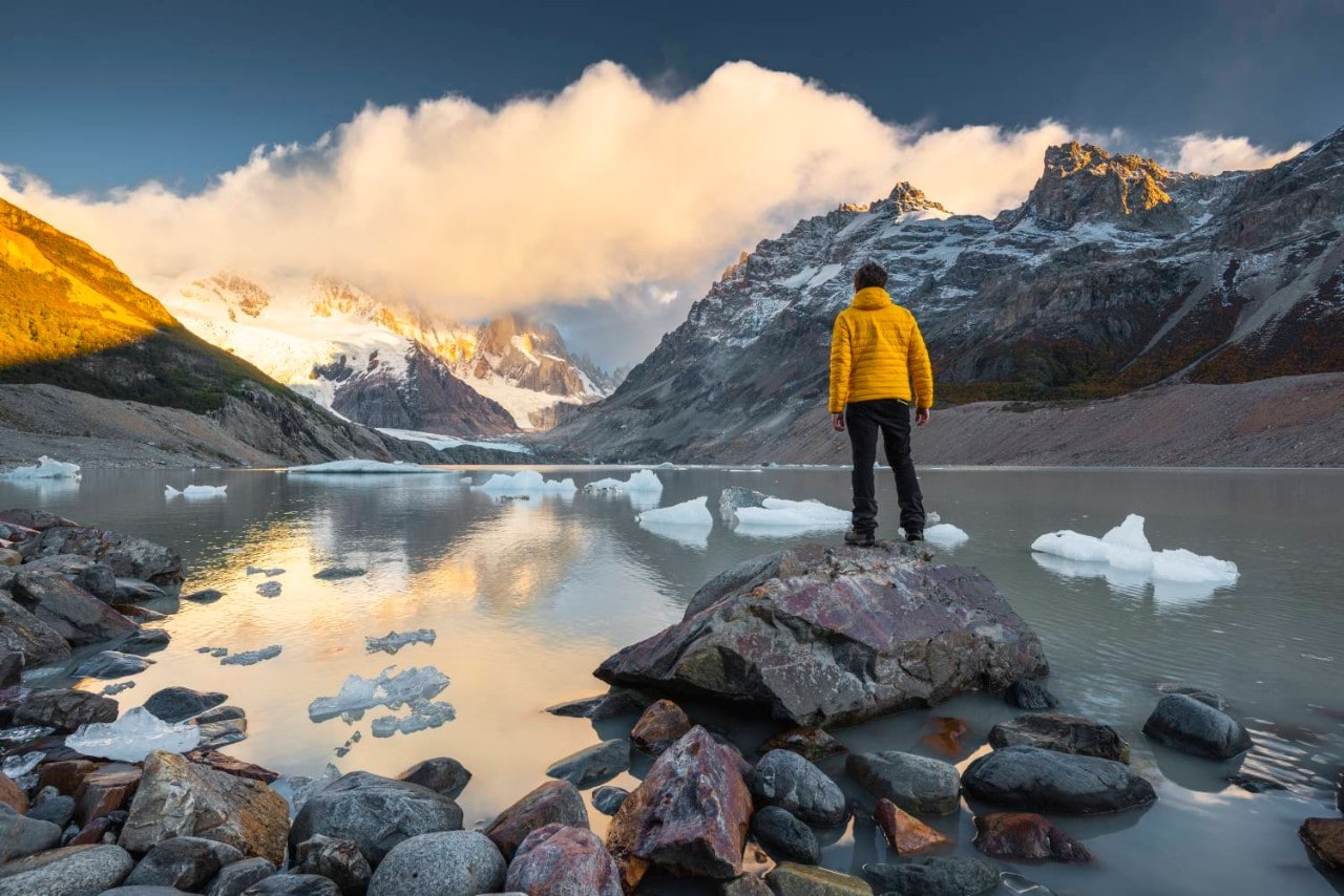 Man looking across lake