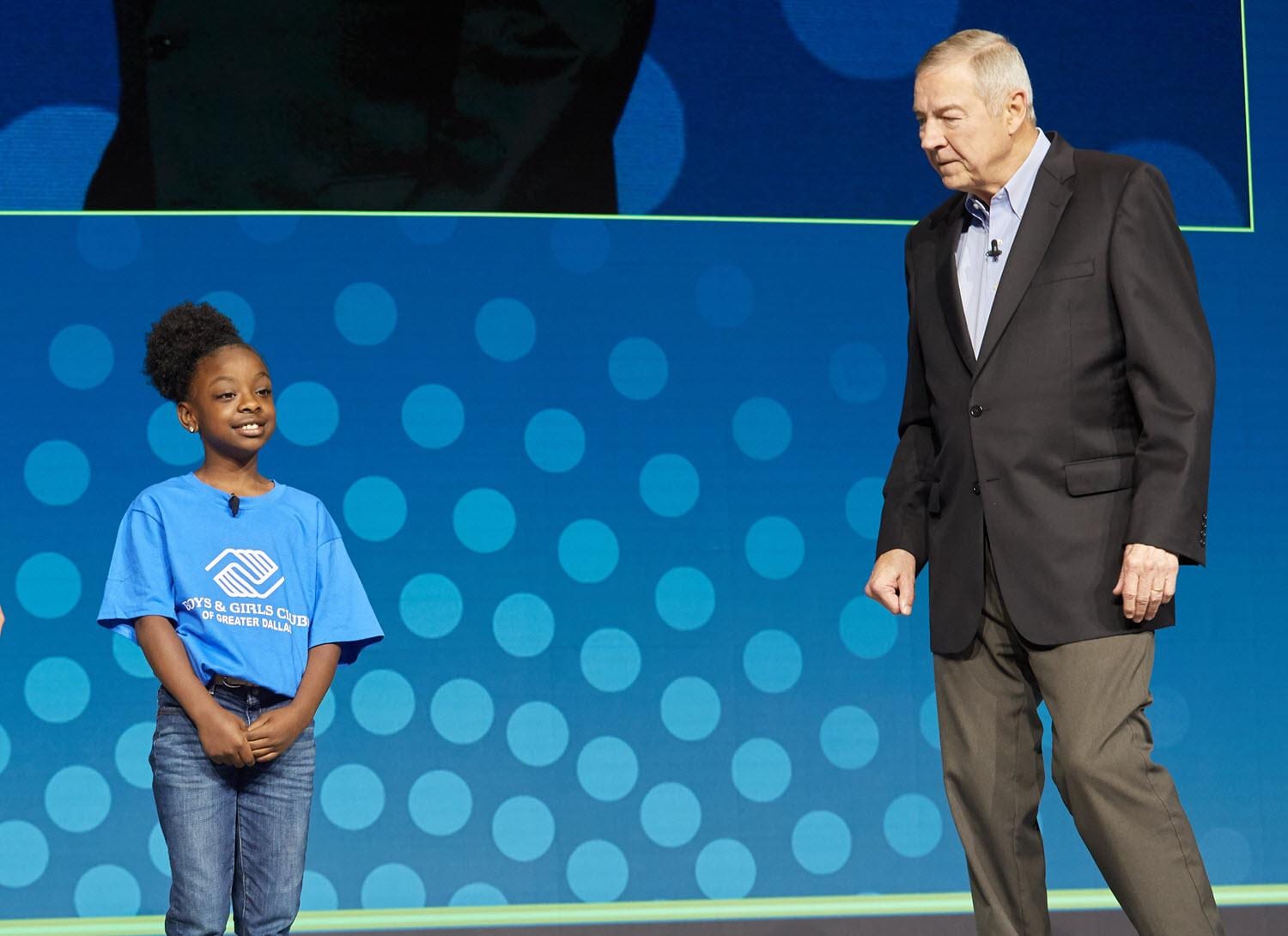 Dr. Jim Goodnight on SAS Global Forum 2019 stage with Jeneah Johnson from Boys and Girls club