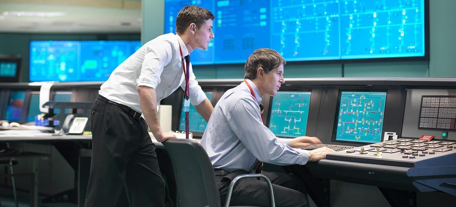 Operators in power station control room