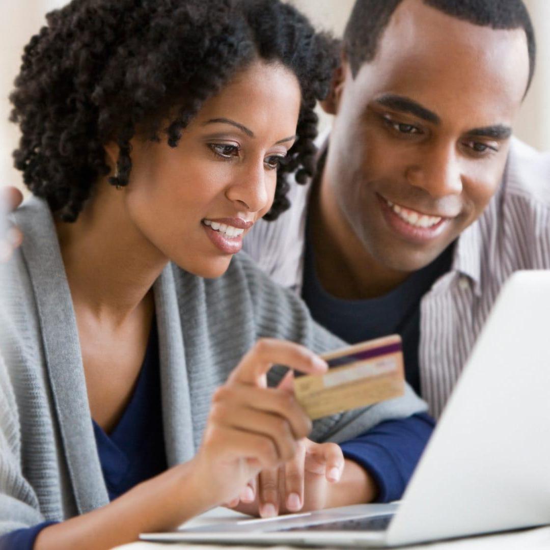 African American couple shopping online