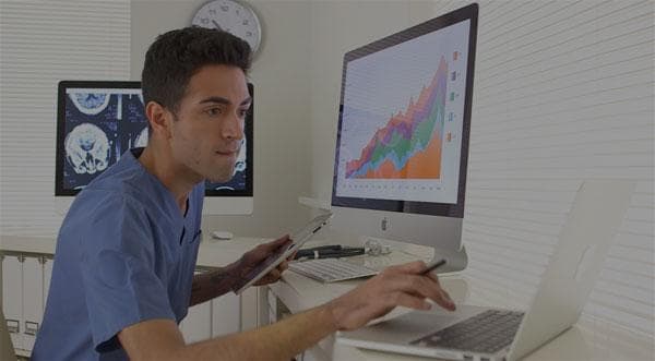 Crescentcare video thumbnail - doctor using computers