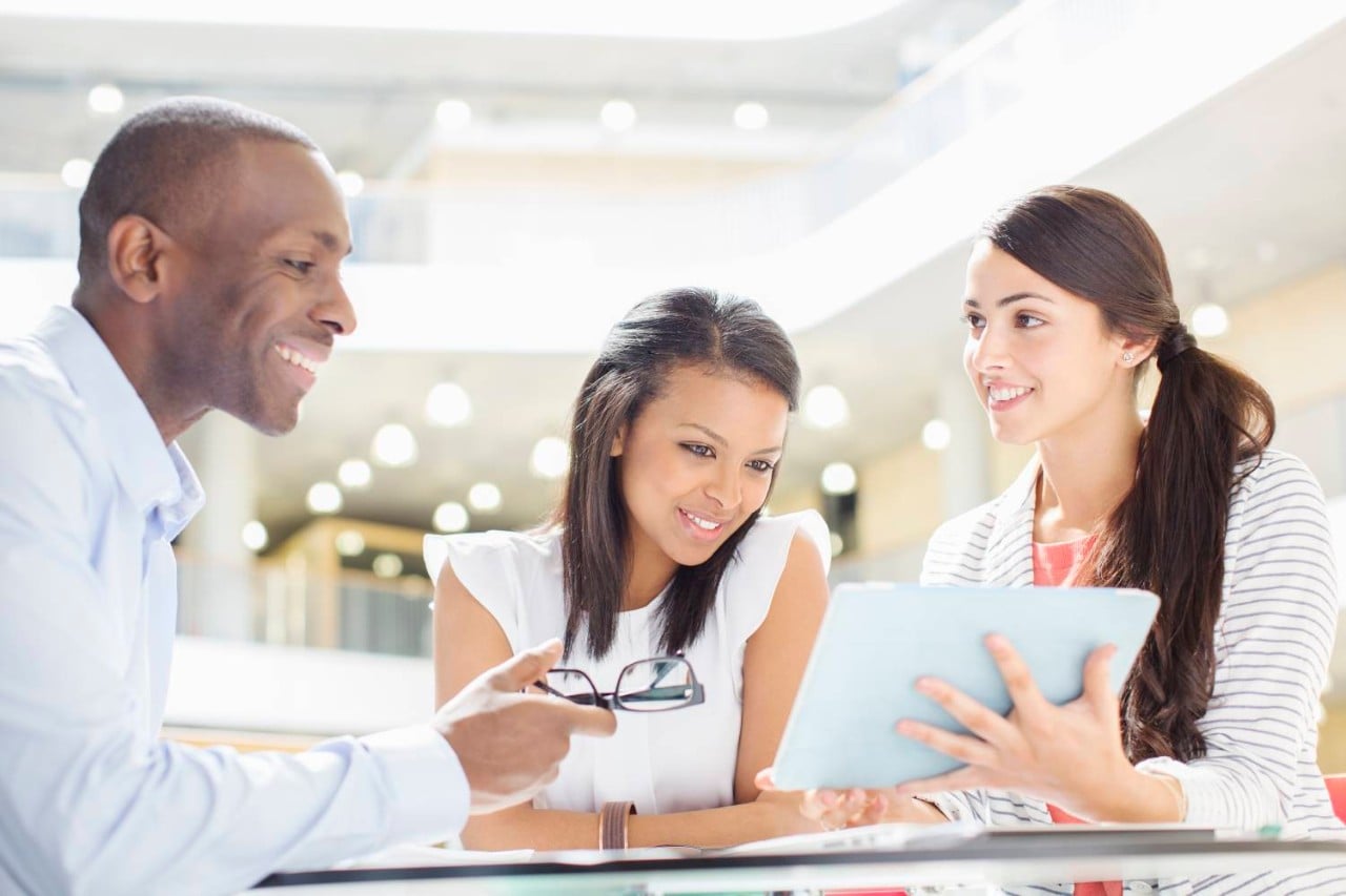 Business People Meeting with a Tablet