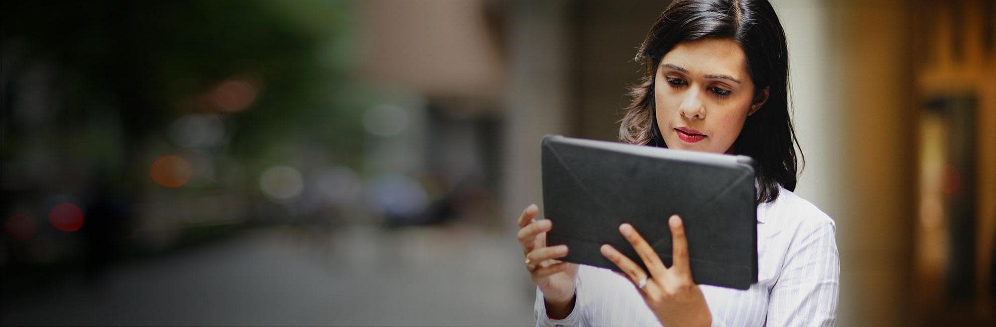 woman-with-tablet-outside-building.jpg