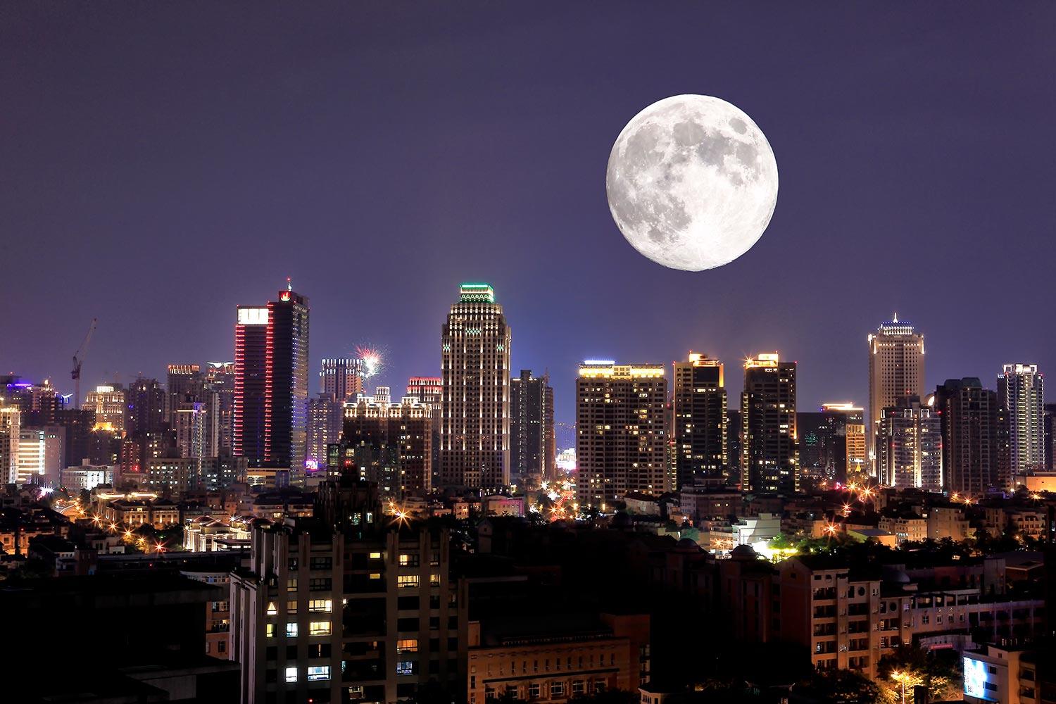 Full moon over city of Taichung Taiwan