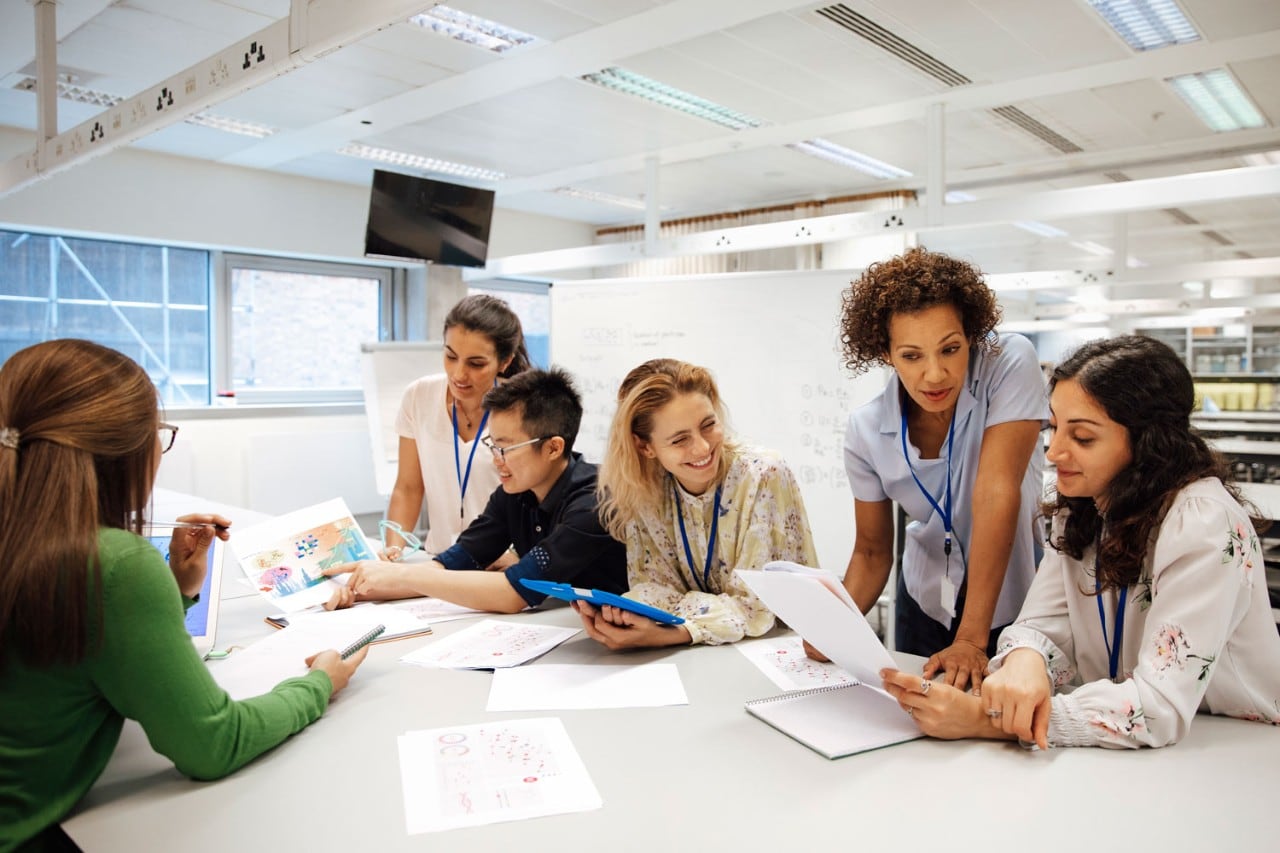 Teacher providing feedback to students