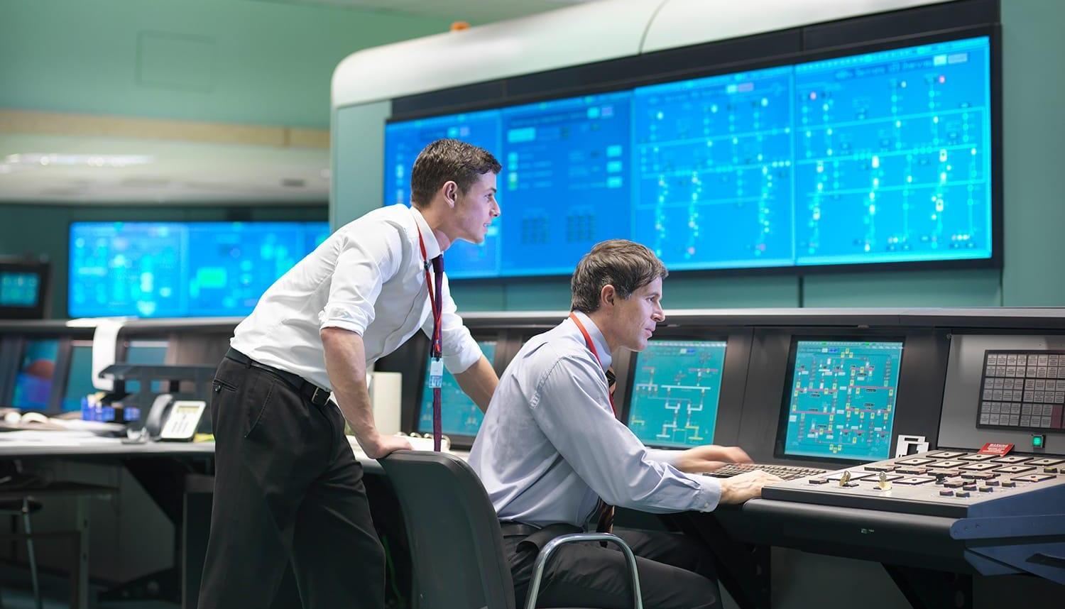 Operators in power station control room