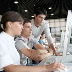  Group of students working together on computer