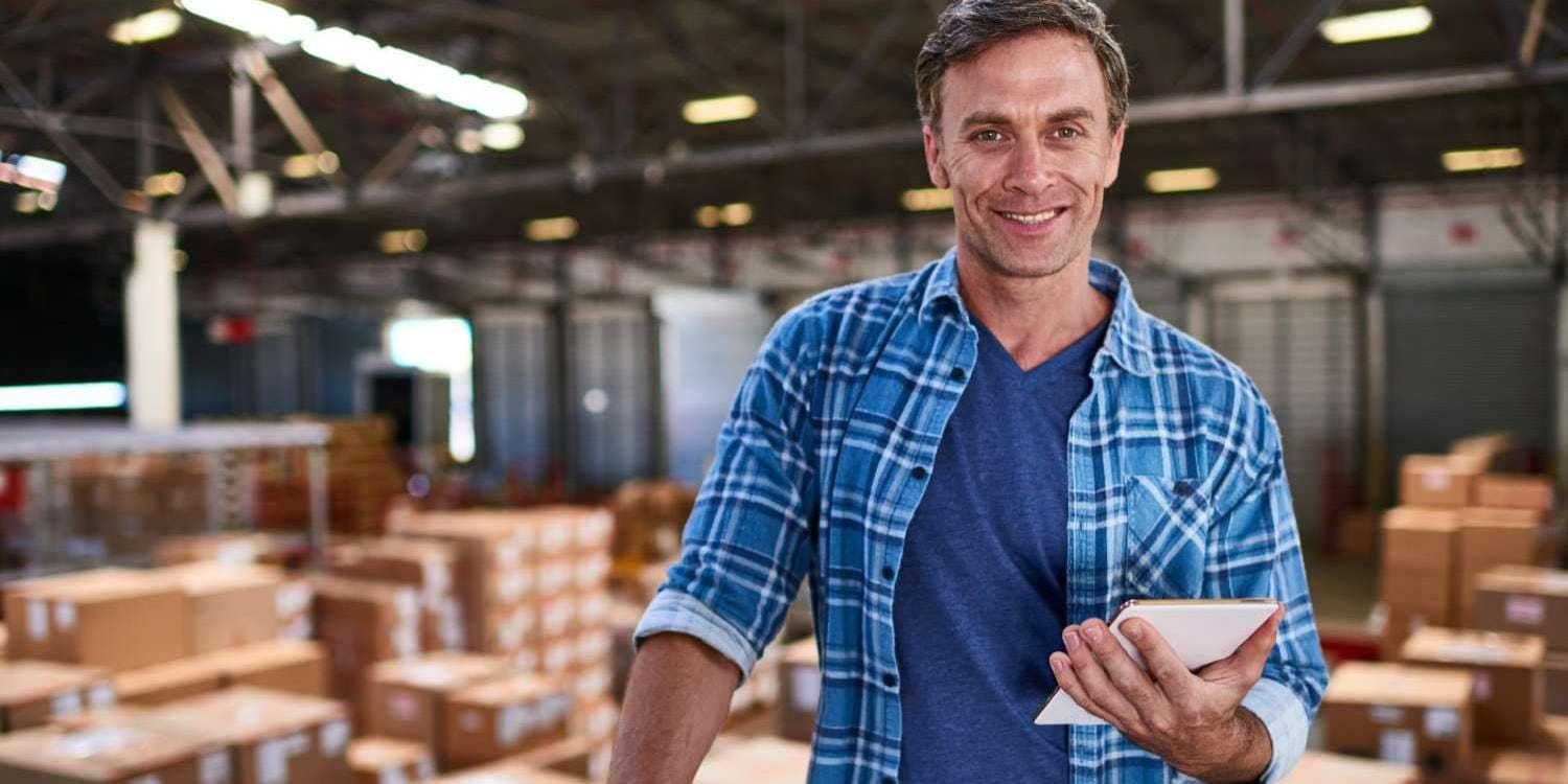 Warehouse worker holding a tablet