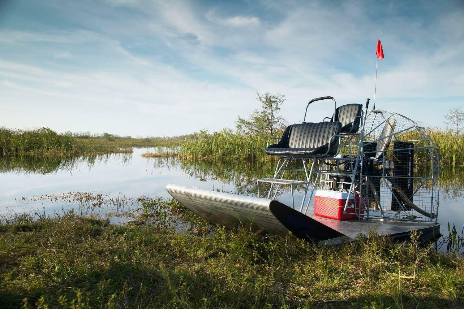 Air boat on bank of creek, Everglades, Florida, USA  