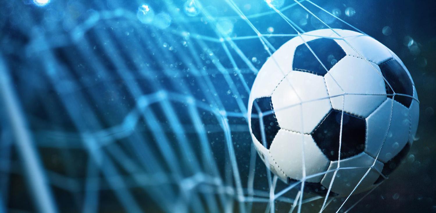 Soccer ball inside a soccer goal Soccer ball inside a soccer goal