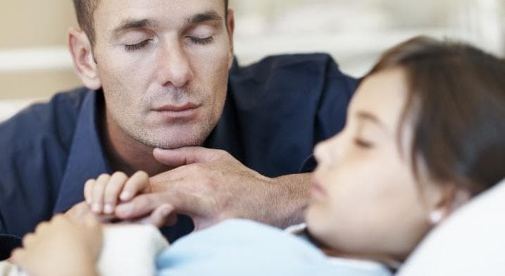 Young girl in hospital bed