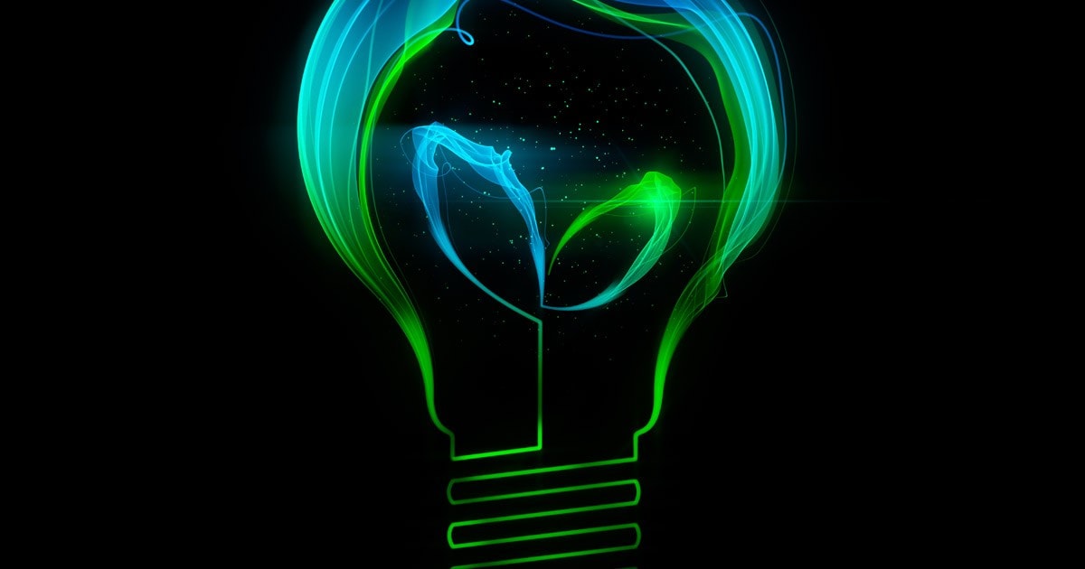 Light bulb with leafs made up of abstract energy 