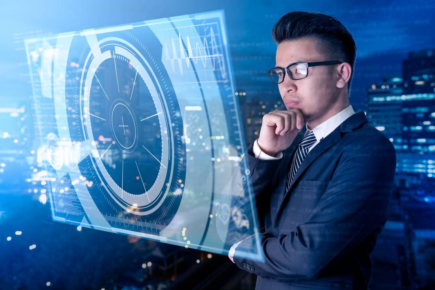 Asian Thai Businessman Looking at Futuristic AI, Cybersecurity, IoT type Digital Panel on a Bangkok Building Rooftop Asian Thai Businessman Looking at Futuristic AI, Cybersecurity, IoT type Digital Panel on a Bangkok Building Rooftop