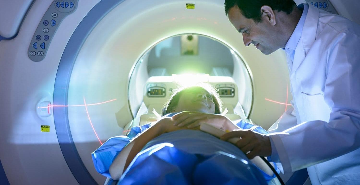 Doctor and patient using Magnetic Resonance Imaging 