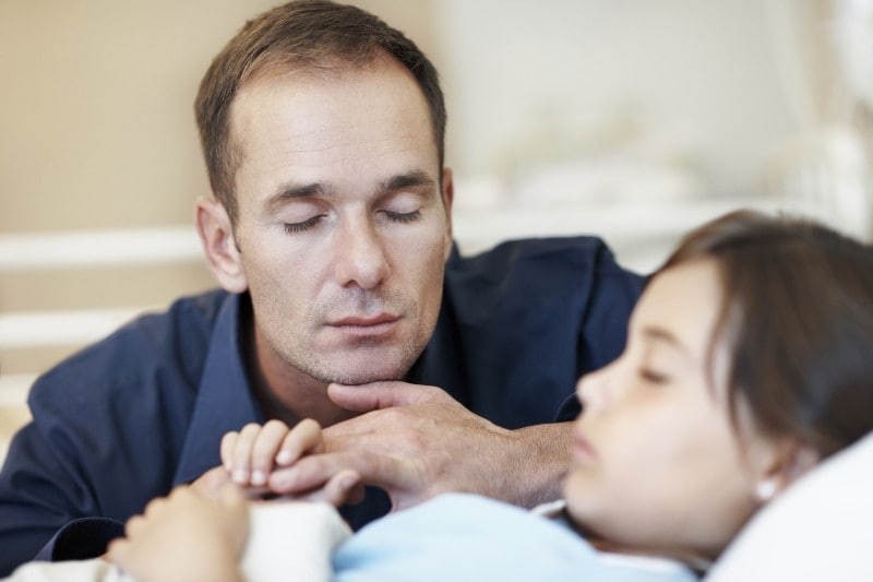 Young girl in hospital bed