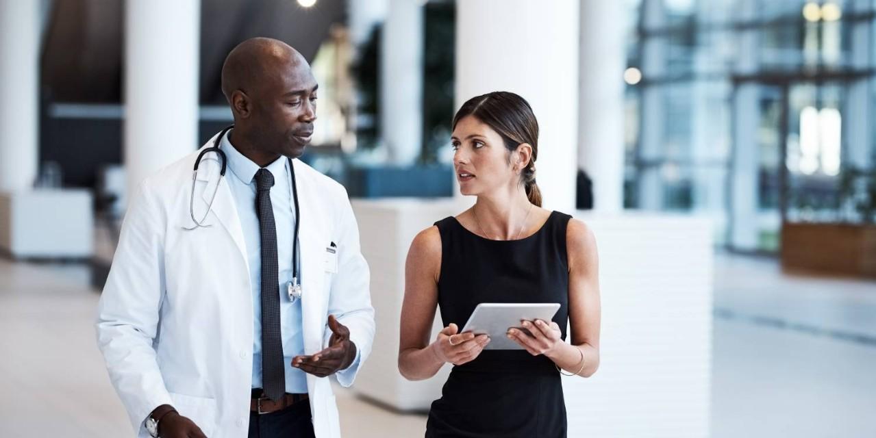 Doctors talking in hallway