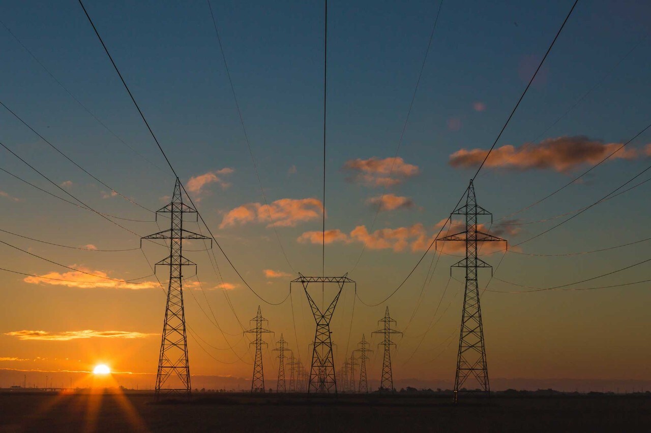 Power towers and lines at sunrise