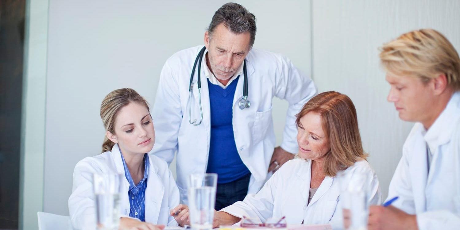 Small group of doctors having a serious meeting