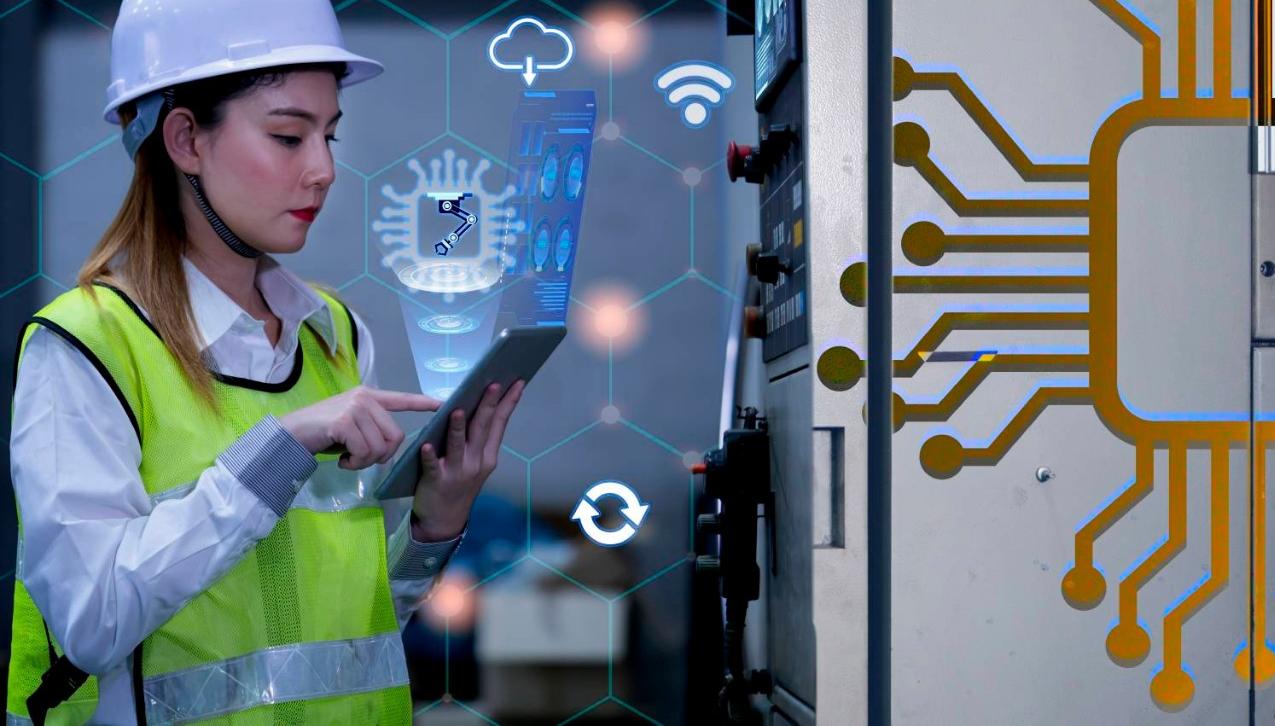 Female engineer using a smart control tablet