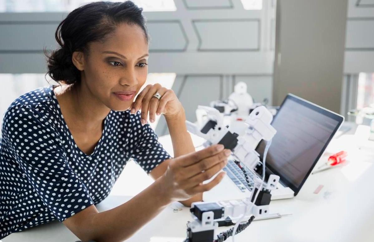 Woman admiring robot AI