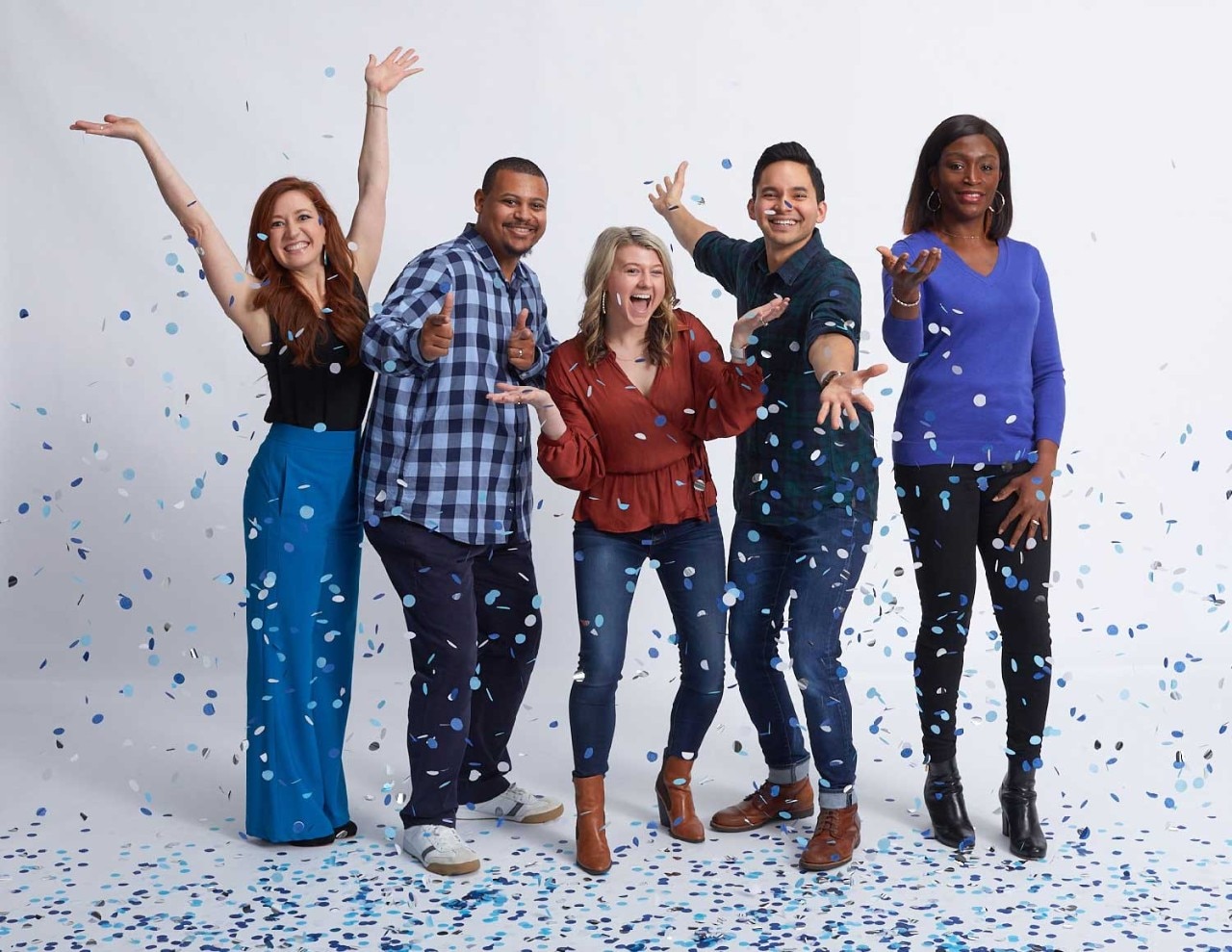 Five SAS employees celebrating with confetti shower