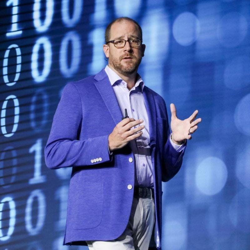 Gavin Day speaking on stage at SAS Innovate