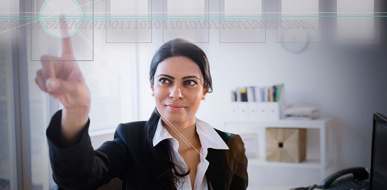 Business woman using touchscreen